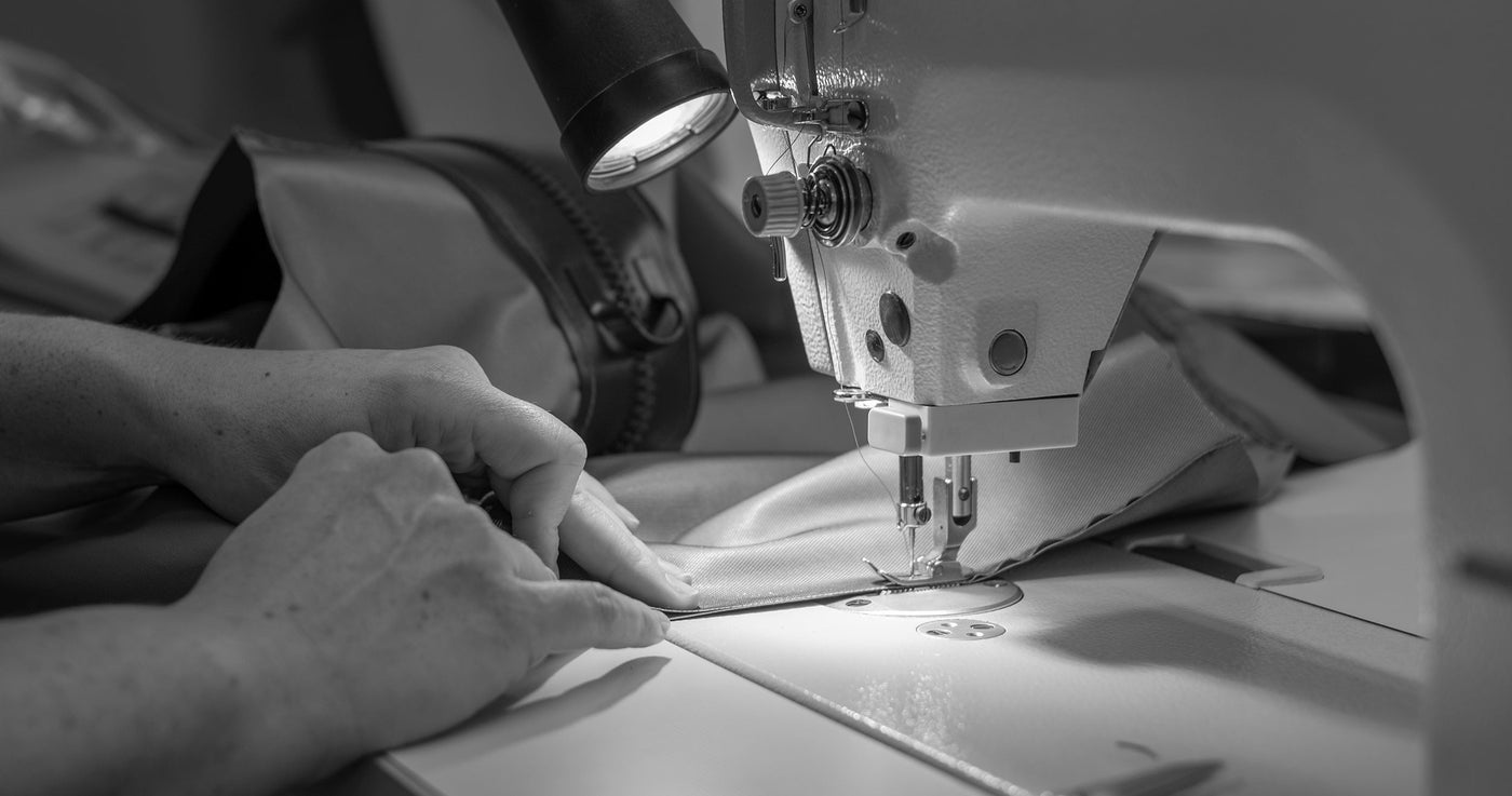Lady-sewing-dry-suit
